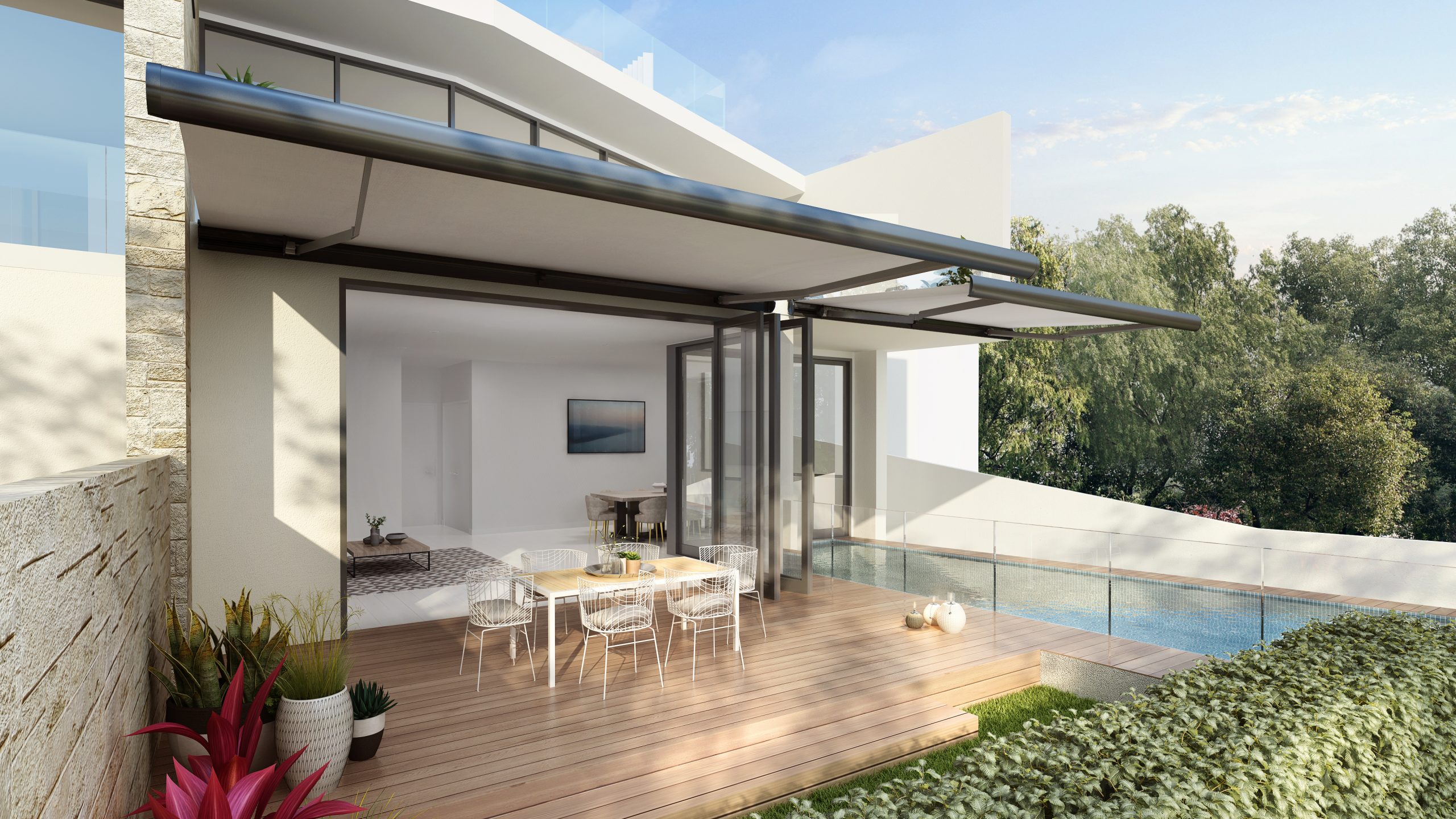 Modern patio with glass doors opening to a wooden deck.